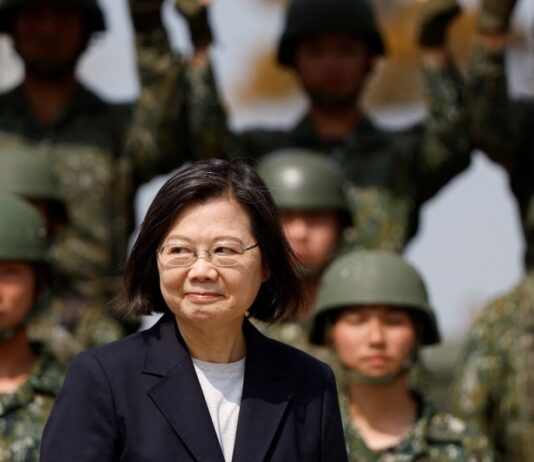 Taiwan president reviews troops ahead of sensitive U.S. visit