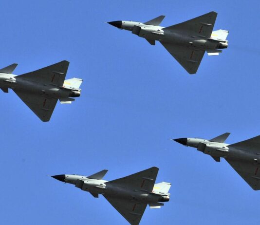 As Taiwan prepares for anti-invasion exercises, China sends dozens of warplanes toward the island