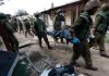 Hamas gunmen ‘killed families in their beds’ at Kfar Aza kibbutz, say Israeli forces