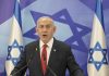 Netanyahu says ‘last minute crisis’ with Hamas holding up approval of Gaza truce and hostage deal