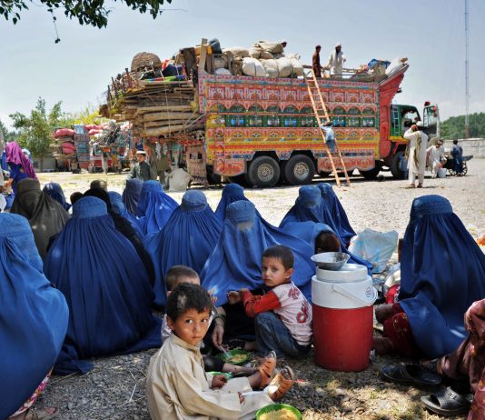 Afghan Refugees Pour Back from Iran to Escape Ongoing War