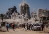 Israel Launches Gaza Offensive, Strikes Tall Building and Issues Warnings