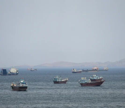 Strait of Hormuz Incident: IRGC Claims Seizure of Two Vessels for Violations