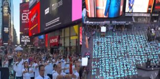 International Yoga Day dawns on Times Square with people reflecting universality with all nations and ethnicities